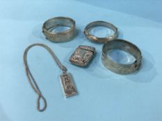 Assorted silver including bangles, a vesta etc