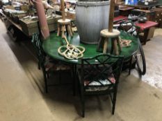 Green bamboo style circular table and four chairs