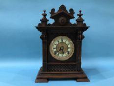 A walnut cased clock