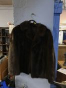 A quarter length fur coat