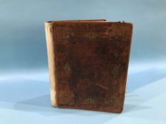 A leather bound Victorian visitors album with inscriptions and illustrations