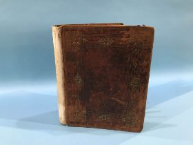 A leather bound Victorian visitors album with inscriptions and illustrations