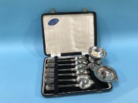 An Irish silver tea strainer 1973, and a matched set of six teaspoons, including Thomas Robinson,