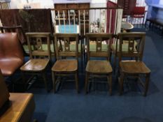 A set of four church chairs