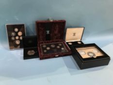 Various silver proof coins, in cases