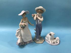 Two boxed Lladro figures and a boxed polar bear