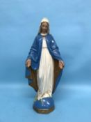A plaster model of Mary with a serpent at her feet