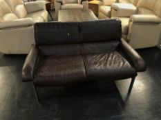 A Pieff brown leather and chrome two seater settee