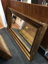 A large wood framed mirror, 180 x 100cm