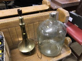 Carboy and a brass lamp