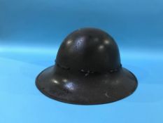 Military tin helmet