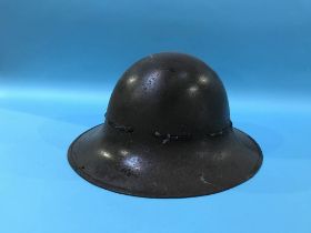 Military tin helmet