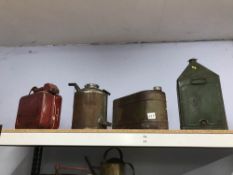 Four oil/petrol cans