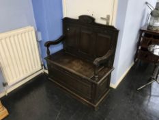 A small oak carved settle