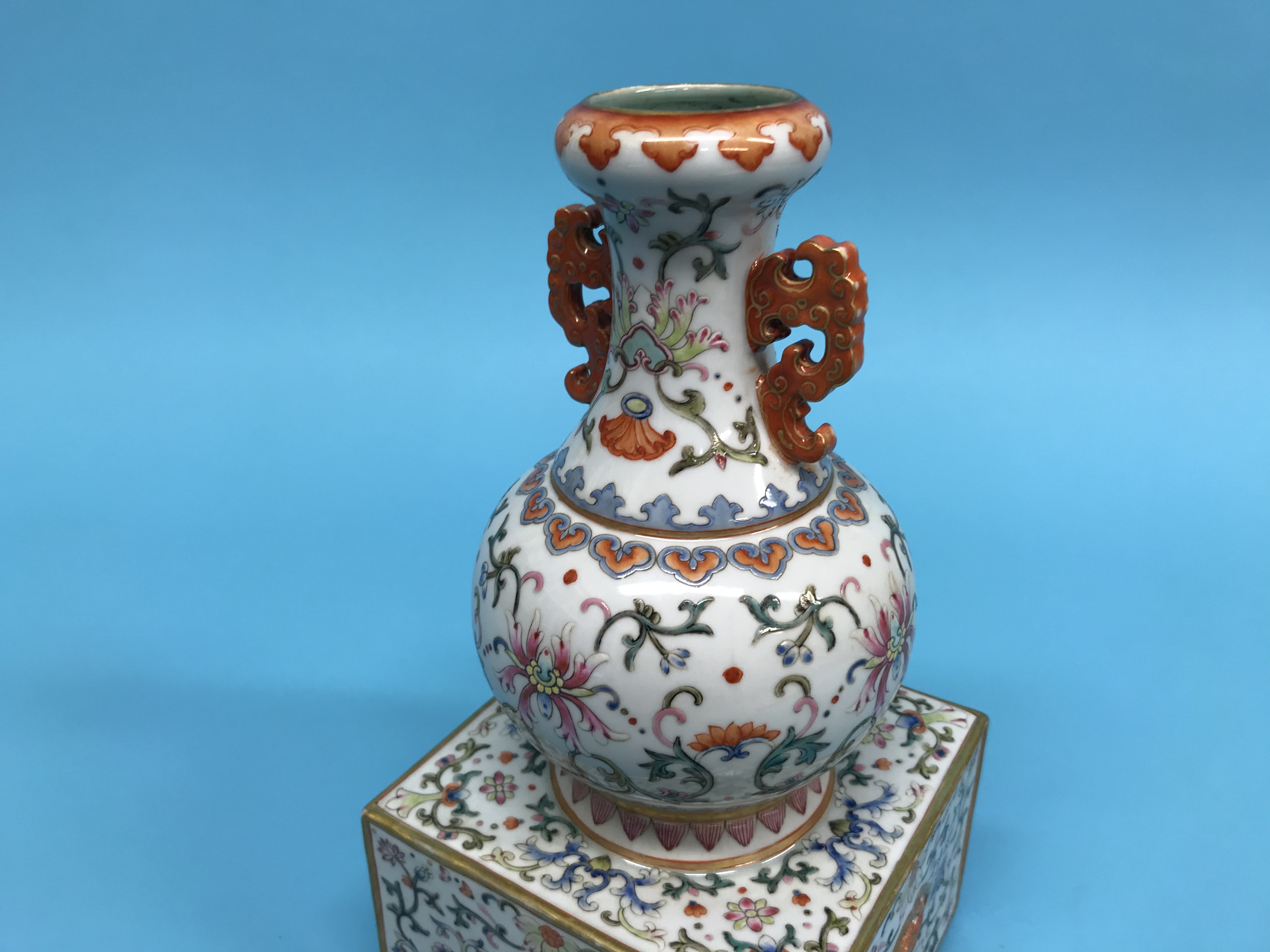 An unusual Chinese Famille Rose two handled vase, supported on a square and pierced base, mark in - Image 16 of 17