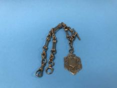 A 9ct Albert chain and fob, stamped '375', Birmingham, 1907, John Mantle, inscribed 'Presented to