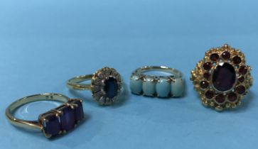 Three rings stamped '375', 11g, and an 18ct gold ring, 4g