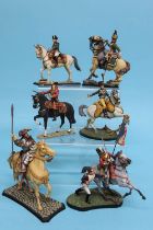 A collection of six various metal painted military figures on horseback