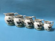 Five graduated Ballyporeen milk jugs