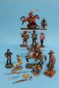 A collection of eleven metal painted American soldiers and Native American figures