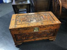 Oriental carved wood chest, W 99cm