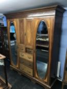 An Edwardian mahogany triple door compactum wardrobe, W 198cm