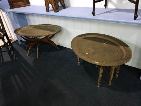 Two brass top oval folding tables
