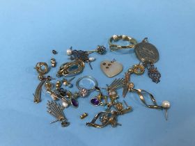 A pair of earrings, stamped '375', a locket and other assorted jewellery