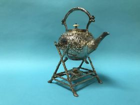 A silver plated spirit kettle and stand
