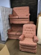 A Parker Knoll armchair and two settees