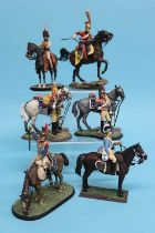 A collection of six various metal painted military figures on horseback