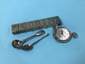 A seven division silver pill box, Ari D . Norman, dated 1993, a braille pocket watch, stamped 925