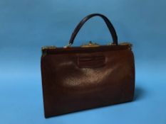 A brown leather handbag by Garfields of London and two compacts