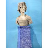 A 19th century quarter length marble bust of a young lady wearing a floral lace edged bonnet, signed