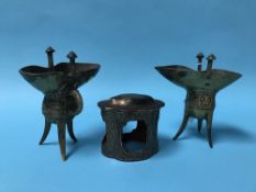 Pair of Chinese bronze vessels and a lacquered stand