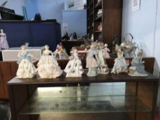 Selection of Coalport, Lladro, Nao and Worcester figures
