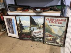 Four framed Canadian tourist posters