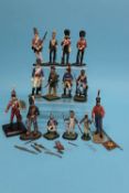 A collection of fourteen various metal painted military figures