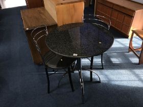 A granite top breakfast table and two chairs
