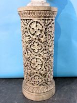 A large pottery circular stand, the sides decorated with birds and stylised foliage, impressed