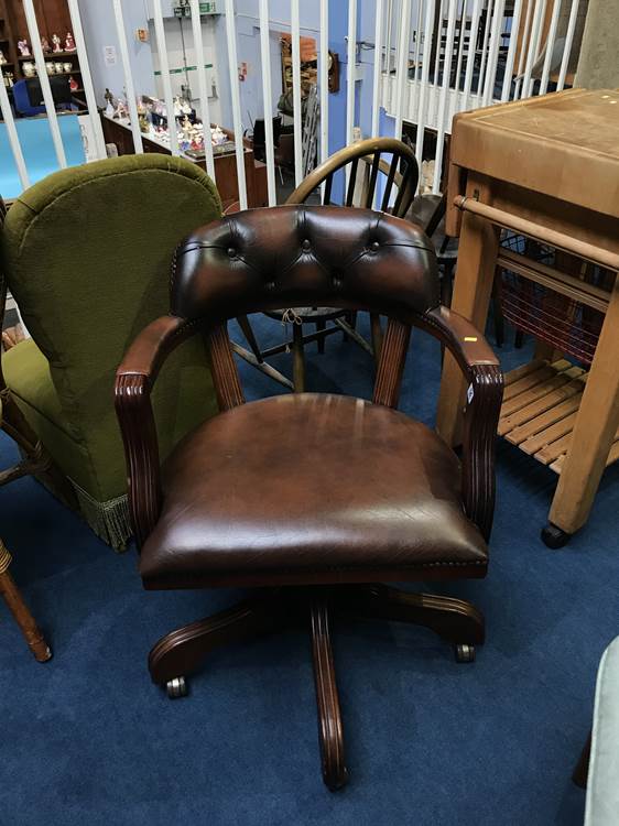 A Chesterfield brown leather office chair