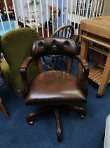 A Chesterfield brown leather office chair
