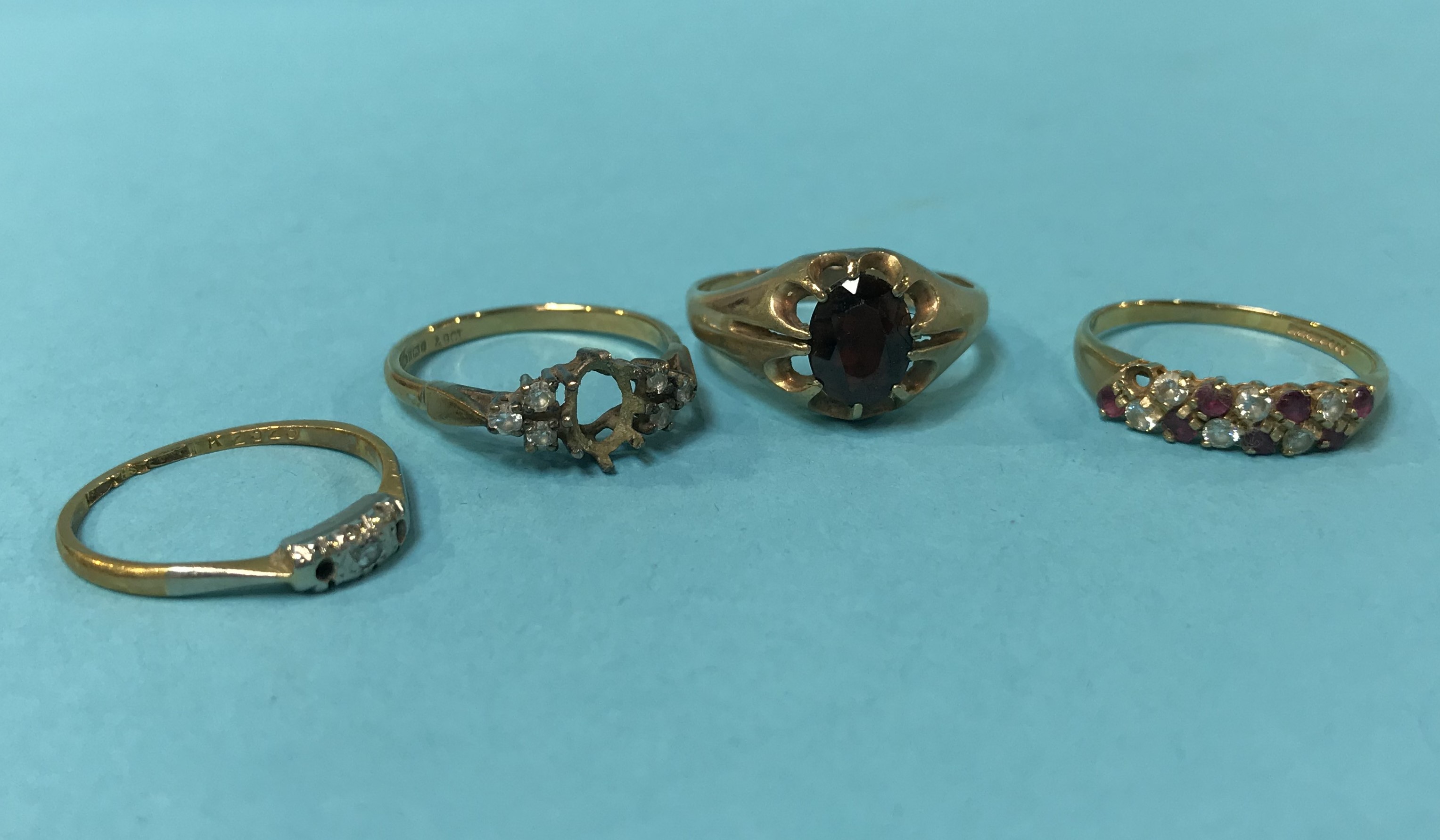 Three 9ct rings, 7.7g and one other