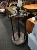 A late 19th Century mahogany revolving snooker cue stand
