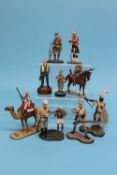 A collection of nine various metal painted military figures