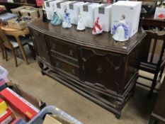 Oak carved sideboard and four oak barley twist dining chairs