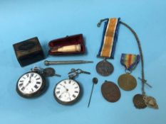 A silver pair case pocket watch, one other silver pocket watch, Albert and Fob, medals to J.T.