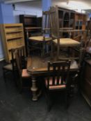 Oak drawer leaf table and eight chairs