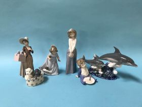 Collection of boxed Lladro and Nao figures