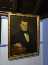 Victorian School, oil, unsigned, half length portrait of a Gentleman seated beside a table, 76 x